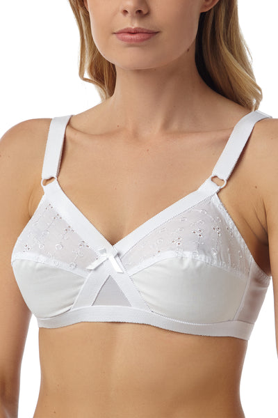 Marlon Grace white  polycotton floral embroidered  broderie anglaise detail soft cup, wireless, wire free bra with crossover styling. Photograph on model