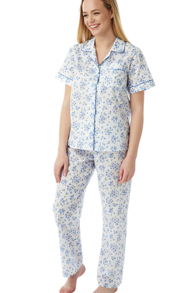 Marlon Faye easy care woven polyester cotton blue floral sprig print short sleeve pyjama with piping and full length pyjama pants with elasticated waist. Photograph on model.