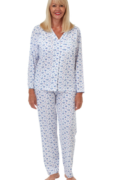 Marlon Sara blue floral print 100% cotton knitted jersey revere collar pyjama with long sleeves, button front opening and full length pyjama pants with fully elasticated waist. Photograph on model